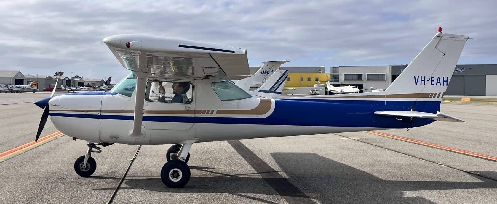 pilot training Perth student learning aircraft control with instructor